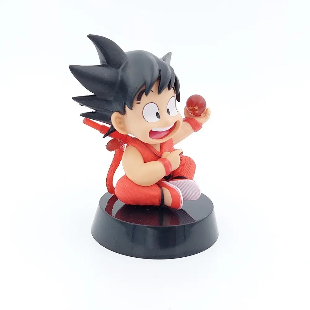 Figura Goku Niño Sentado con Esfera Dragon Ball 12cm Aprox
