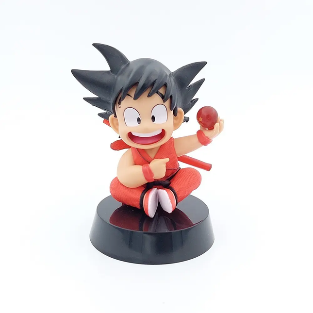 Figura Goku Niño Sentado con Esfera Dragon Ball 12cm Aprox