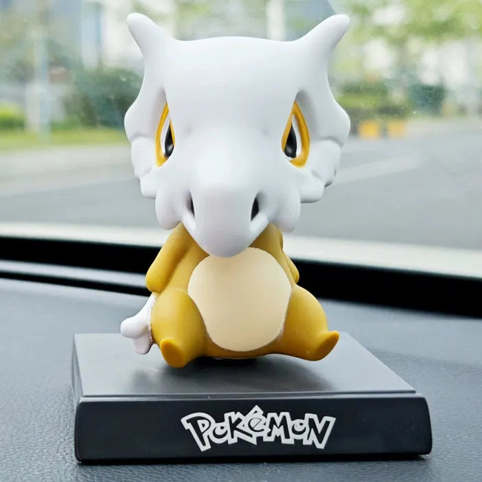 Bobblehead Cubone Pokémon con Soporte para Celular de Auto
