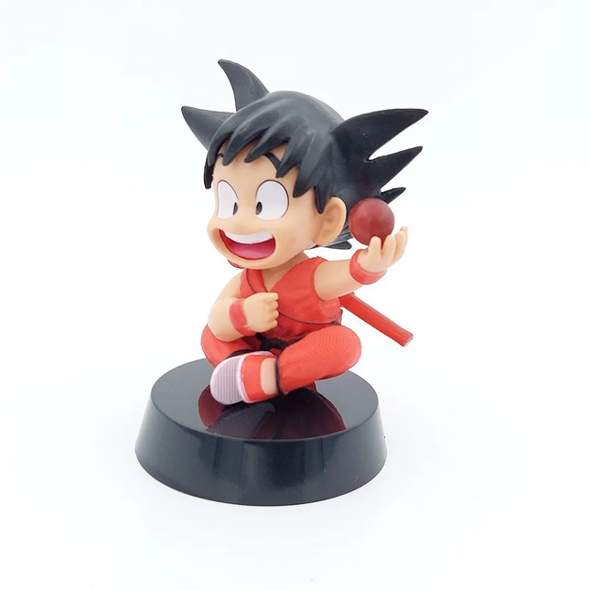 Figura Goku Niño Sentado con Esfera Dragon Ball 12cm Aprox